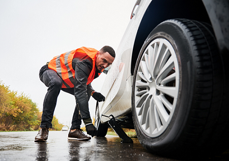 Mechanic Repairing A Car - Breakdown Assistance